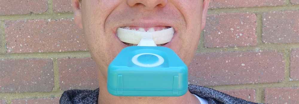 Front on shot of Y-Brush in the mouth
