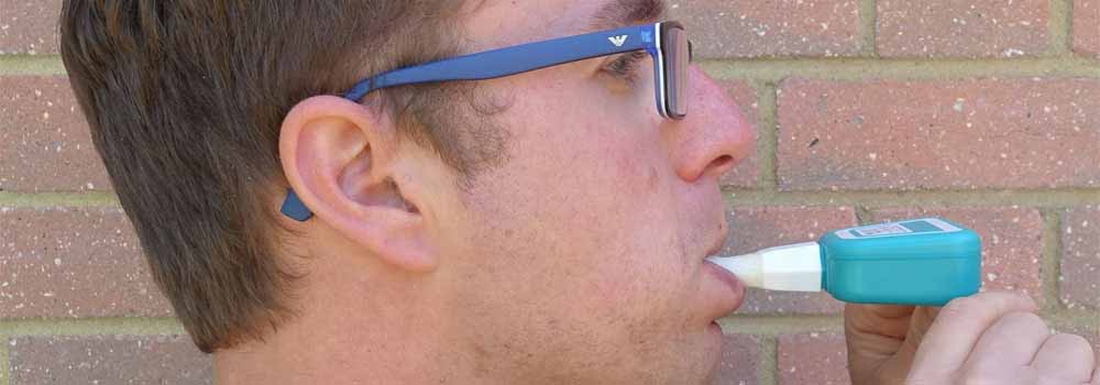Side view of Y-Brush in mouth