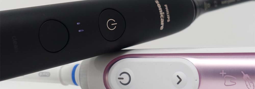 Power buttons on Oral-B Genius X & Sonicare DiamondCLean 9000