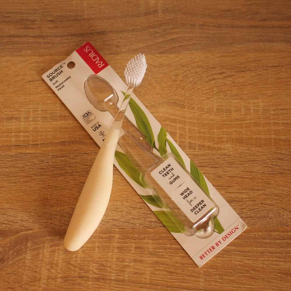 Radius source toothbrush on table top with packagin