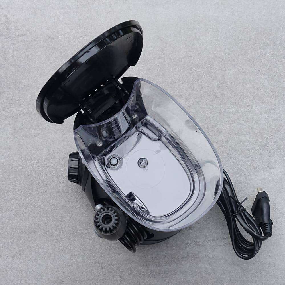 Top down view into the water tank of the Aquarius from Waterpik. The lid is open.
