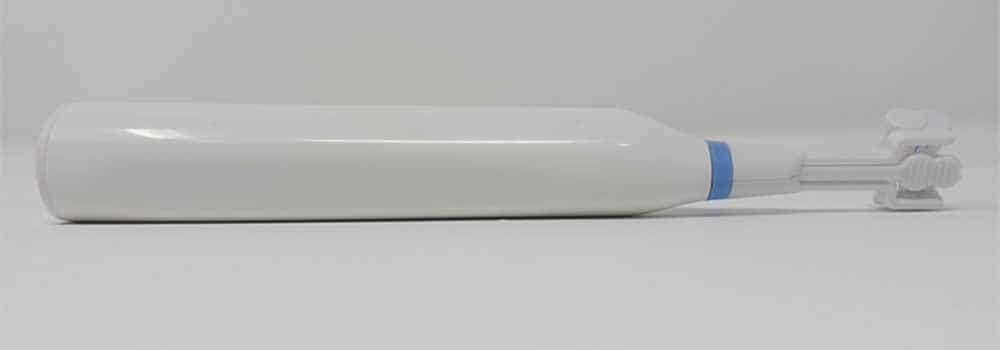 Back of Triple Bristle toothbrush