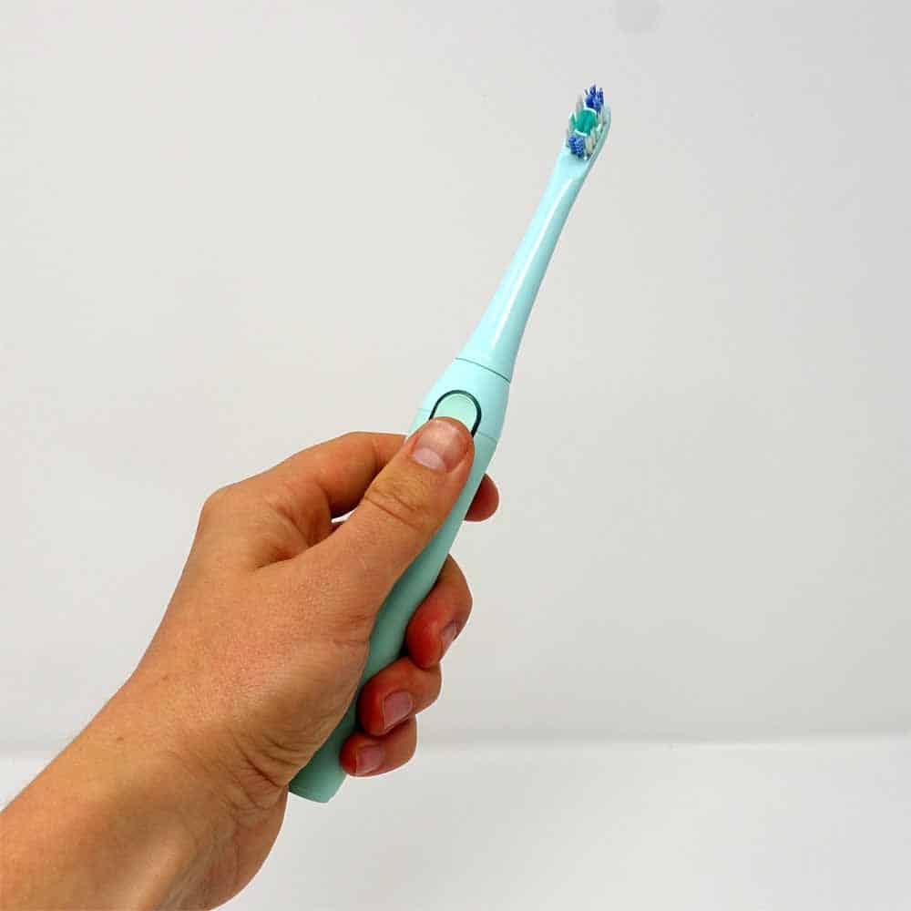 In hand shot of hum by Colgate