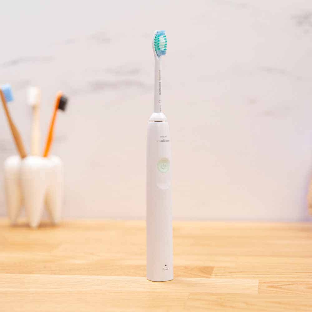 2100 Series electric toothbrush plased on a countertop