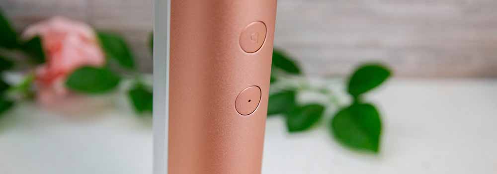 Function buttons on quip water flosser