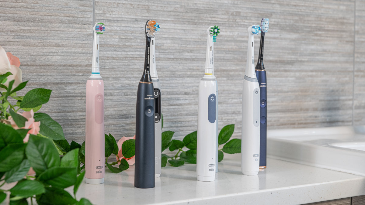 Several toothbrush stood upright next to each other