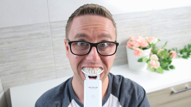 Jon with mouthpiece toothbrush in mouth