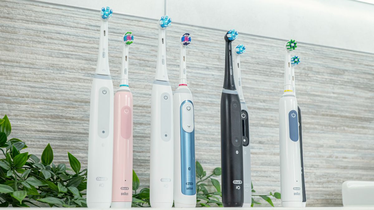 Various Oral-B brushes stood on countertop.
