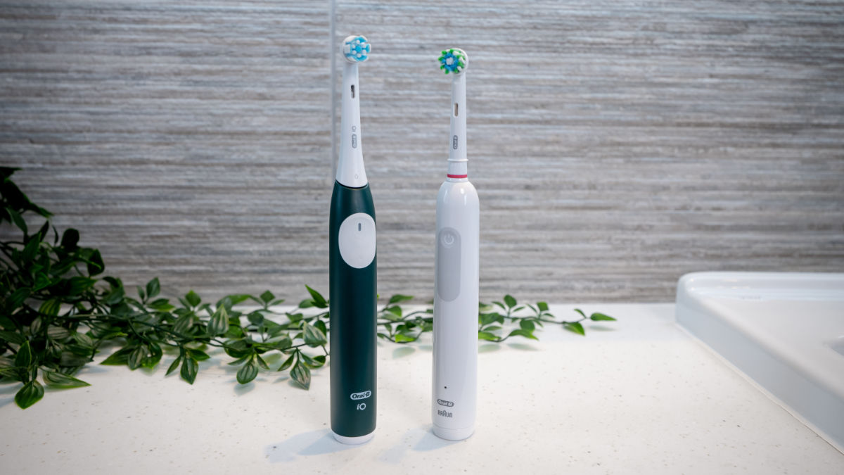 Oral-B iO2 and Pro 1000 stood next to each other