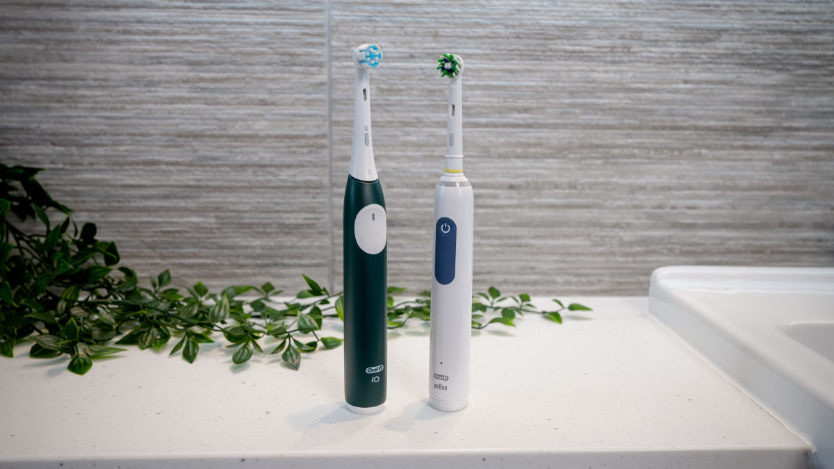 Oral-B iO2 vs Oral-B Smart 1500 stood next to each other